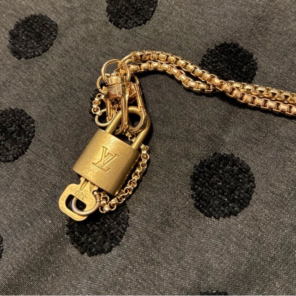 Louis Vuitton brass lock & key with necklace